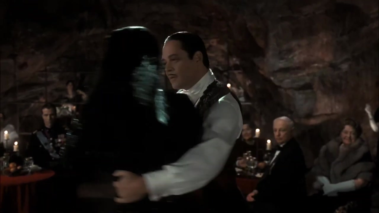 Morticia & Gomez — Tango: a frame of the trend video
